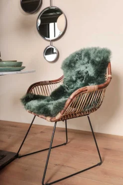 Rattanstuhl mit Armlehne und Metallkufe